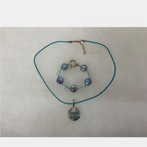 Sterling silver & blue stone pendant on cord and bracelet